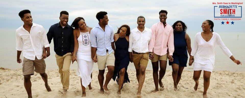 Vibrant group walking on the beach supporting Bernadette Smith for U.S. Senate campaign.