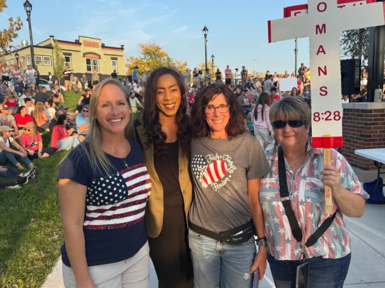 Patriotic women at a community event celebrating American Independence Day.