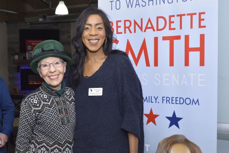 Bernadette Smith with supporter at volunteer event.